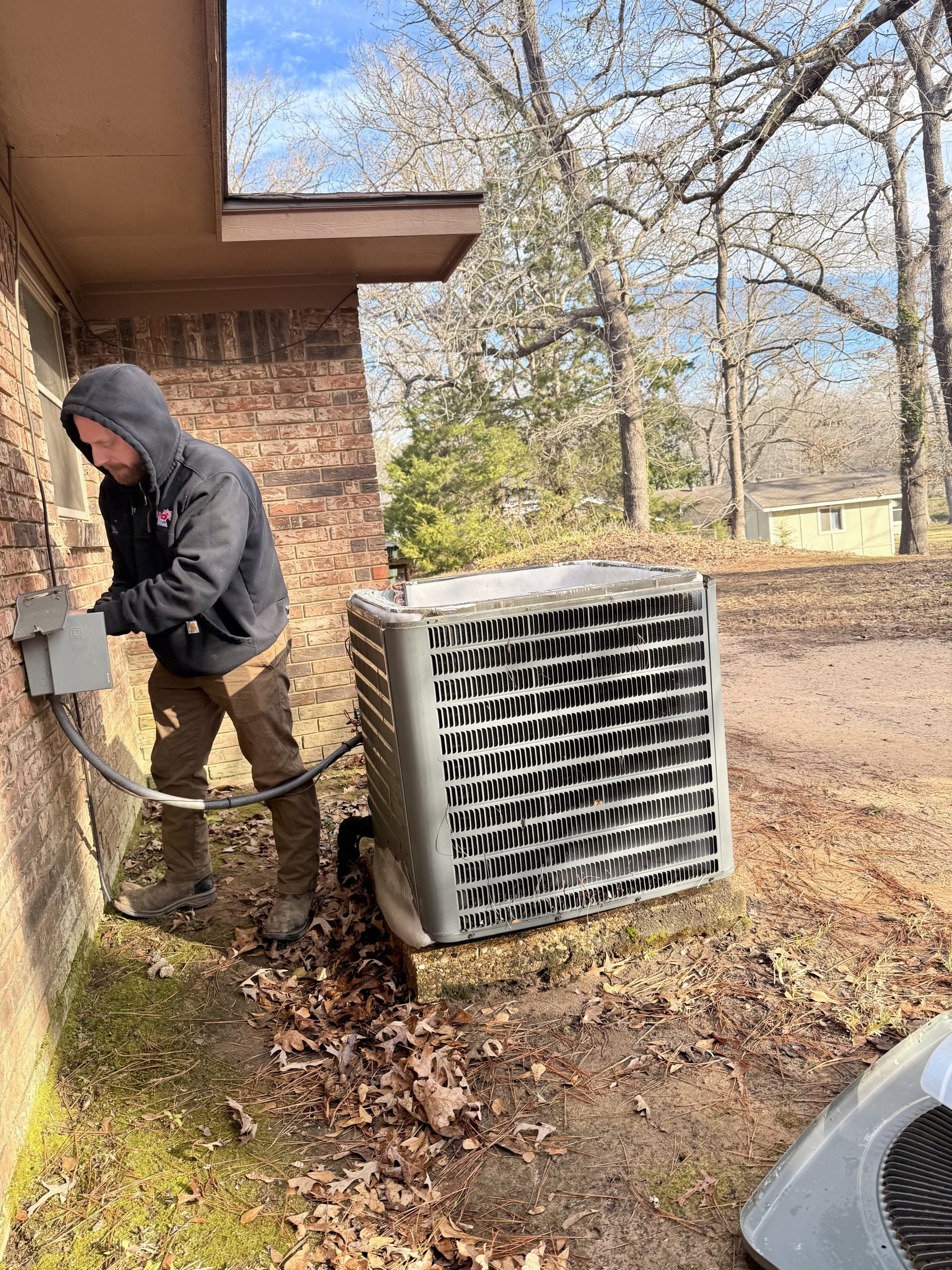 HVAC technician performing AC repair in Tyler, TX