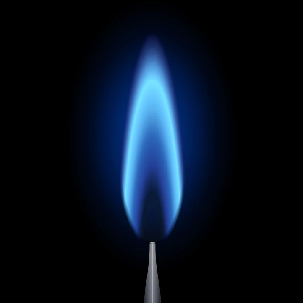 Close-up of a steady blue furnace pilot light flame