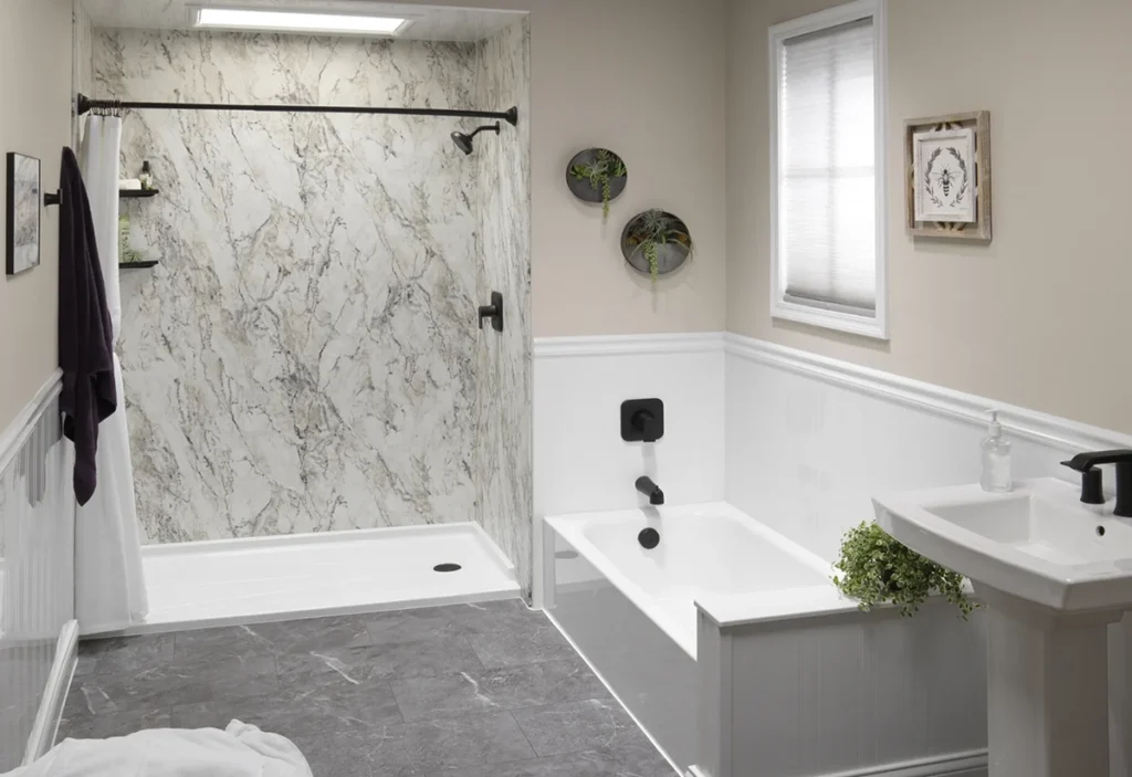 Solid surface shower walls with a marble-look finish in a modern bathroom remodel