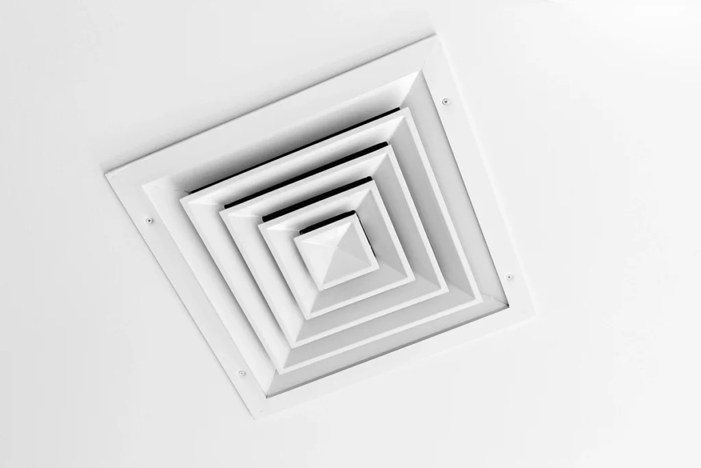 Return air vent installed in a residential ceiling supporting balanced HVAC airflow
