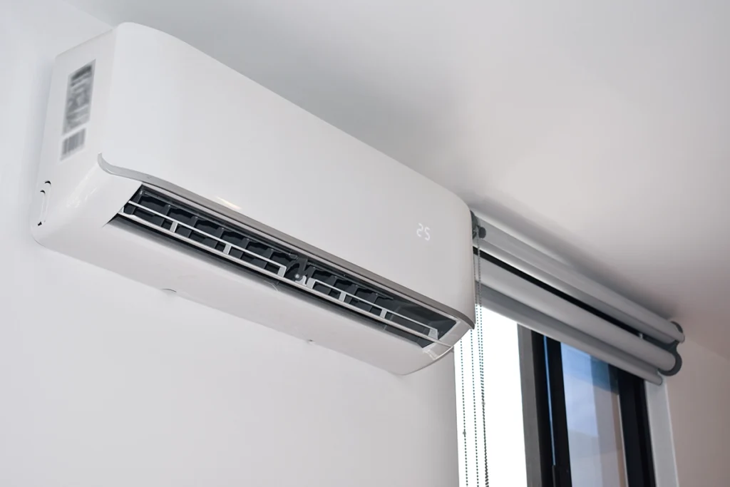 24000 BTU mini split indoor wall unit installed in a home room for cooling and heating comfort